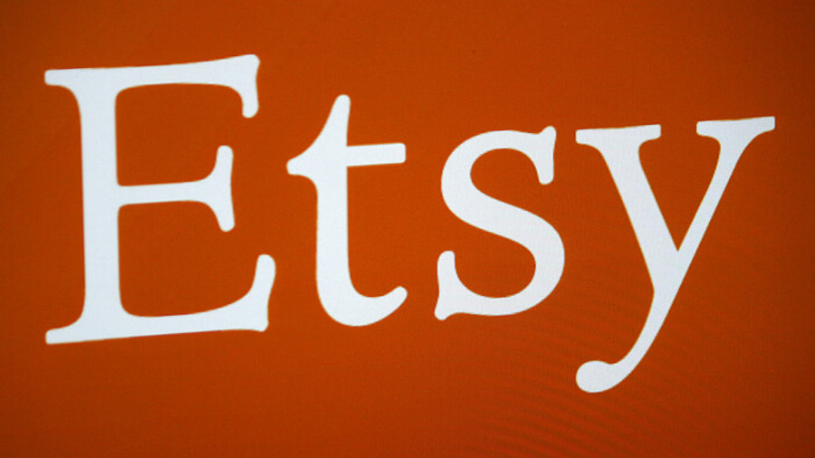 Wei&szlig;es Etsy-Logo auf orangefarbenem Grund