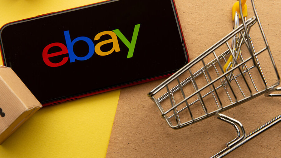 Ebay Symbol mit kleinen Boxen und Einkaufswagen