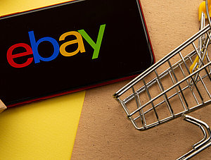 Ebay Symbol mit kleinen Boxen und Einkaufswagen