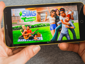 Videospiel „Die Sims“ auf einem Smartphone