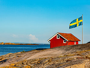 Rotes Haus in Schweden am Wasser