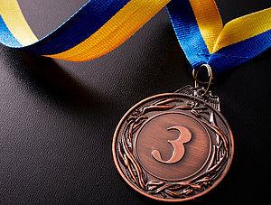 Bronze-Medaille auf dunklem Grund