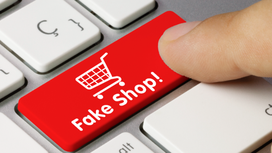 Taste auf einer Tastatur in rot mit der Aufschrift: Fake Shop