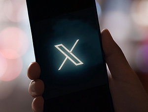 X-Logo auf Smartphone