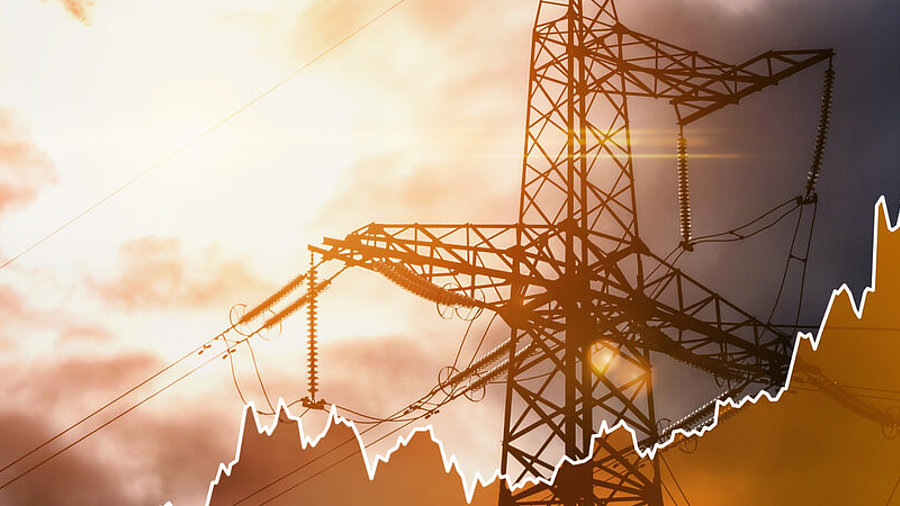 &Uuml;bertragungsturm und Zellendiagramm, die die Strompreise w&auml;hrend der globalen Energiekrise darstellen.