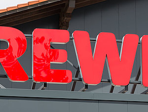 Logo der Supermarktkette Rewe